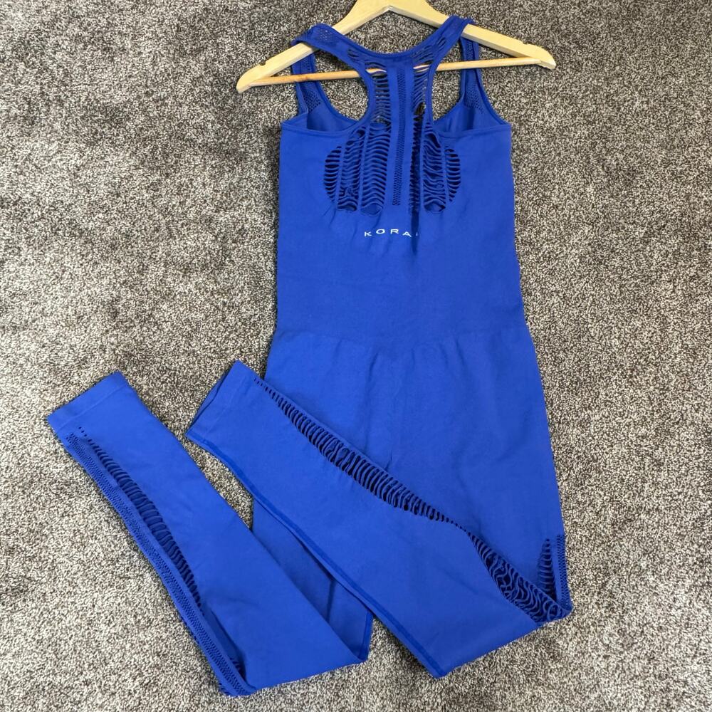 KORAL Activewear Jumpsuit Shredded Pool Blue Size Medium Strappy Gym Workout